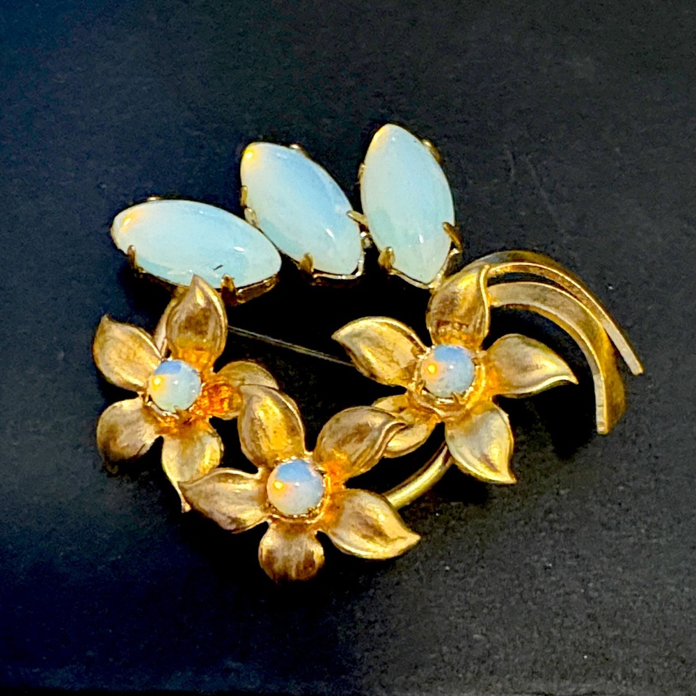 Vintage brooch with opalescent stones, gold tone, floral design